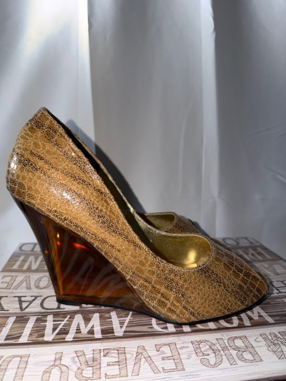 Women's unique tan snake skin body, peep toe amber wedge heel a stilletto look